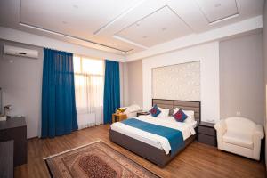 VATAN DUSHANBE HOTEL में एक कमरे में एक या कई बेड