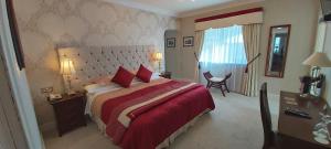 Cama ou camas em um quarto em Brook Manor Lodge