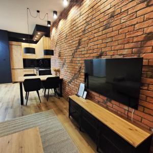 Televisyen dan/atau pusat hiburan di Asti Apartamenty Centrum Stargard