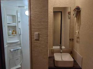 Bathroom sa Mini Inn Kyoto 京都 - 外国人向け - 日本人予約不可