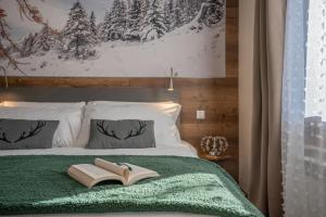 Легло или легла в стая в Diamante ampio monolocale stile chalet alpino