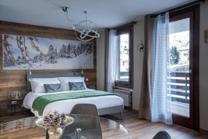 Легло или легла в стая в Diamante ampio monolocale stile chalet alpino