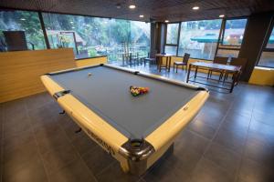 a pool table in the middle of a room at Tam Coc Lion Kings Hotel & Resort in Ninh Binh