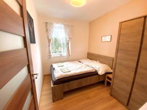 Krevet ili kreveti u jedinici u objektu Chalet 3 Domky 182