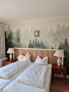 Säng eller sängar i ett rum på Harz Hotel Waldhaus