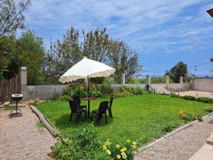 Um jardim em Linda casa de campo en Mejia - Arequipa