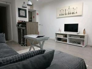 TV i/ili multimedijalni sistem u objektu Alfama New Apartment 28925/AL