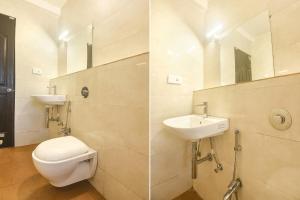 Kamar mandi di FabExpress Holiday Suites