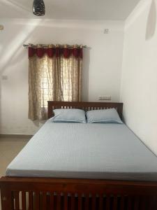 Легло или легла в стая в Takashi Homestay North Paravur Near Muziris