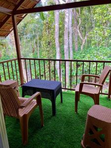 Balkonas arba terasa apgyvendinimo įstaigoje Coorg klusters estate stay