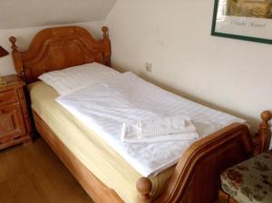 Cama ou camas em um quarto em Thüringer Hof