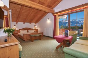 Кът за сядане в Alpenhotel Hundsreitlehen