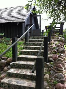 a set of stairs leading to a house at Chill Inn in Bernāti