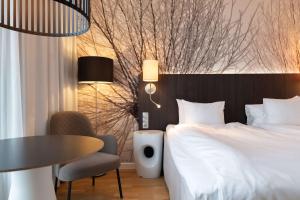 Postel nebo postele na pokoji v ubytování Best Western Plus Park City Lund