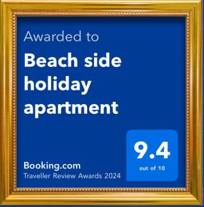 Denhams Beach side holiday apartment tesisinde sergilenen bir sertifika, ödül, işaret veya başka bir belge