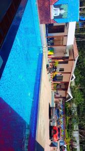 Piscina a Nemmadhi Homestay o a prop