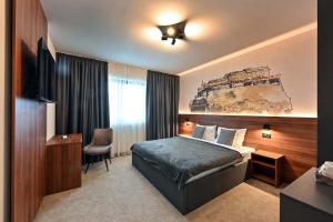 Katil atau katil-katil dalam bilik di Tvrdjava Rooms - Novi Sad