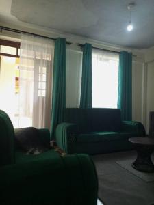 Uma área de estar em Eagles one bedroom in Kisii CBD with Balcony