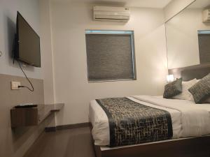 Apollo Guest House में एक कमरे में एक या कई बेड