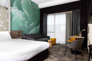 Voodi või voodid majutusasutuse Otium Hotel Roosendaal toas