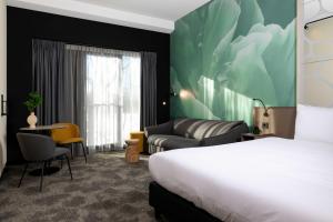 Voodi või voodid majutusasutuse Otium Hotel Roosendaal toas