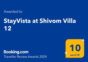 Um certificado, prêmio, placa ou outro documento exibido em StayVista's Shivom Villa 12 - A Serene Escape with Views of the Valley and Lake