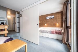 Llit o llits en una habitació de Appartement - Pas du lac - Avoriaz