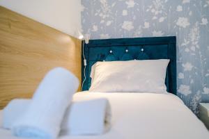 Cama ou camas em um quarto em The Retreat near Salford Quays