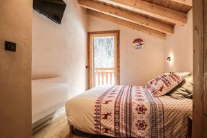 Ліжко або ліжка в номері Alpen Chalet