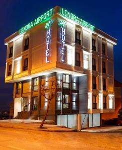 a building with a sign on the front of it at Lenora Airport Hotel & İstanbul Airport in Arnavutköy