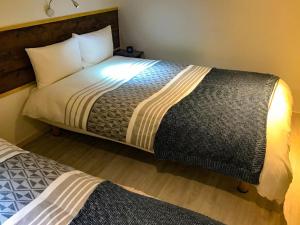 A bed or beds in a room at Niruyakanaya BISE - Vacation STAY 35606v