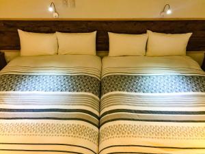 A bed or beds in a room at Niruyakanaya BISE - Vacation STAY 35606v