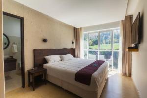 Кровать или кровати в номере Life Hotel Valle Sagrado