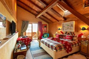 Tempat tidur dalam kamar di Magic Megève Bois