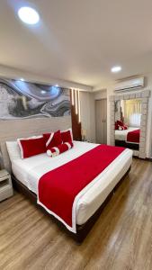 A bed or beds in a room at Cabecera Country Hotel