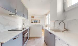 Cuina o zona de cuina de CityStay-Confort- 5 min Metro -