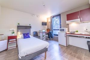 Dapur atau dapur kecil di Montempô Apparthôtel Strasbourg