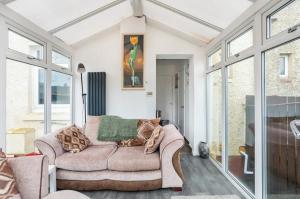 A seating area at Captivating 2 bedroom home with conservatory