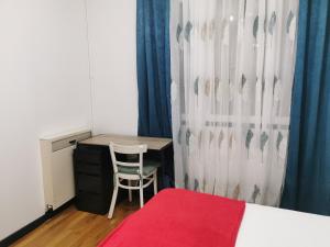 Кровать или кровати в номере Appartement meublés à Villeurbanne Lyon