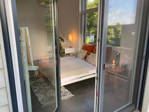 Kamar mandi di Stilvolle Luxus-Villa im skandinavischen Stil mit Sauna, Garten und 2 Katzen