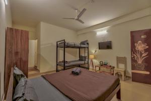 Rosa Bella Resort-TBV में एक कमरे में एक या कई बेड