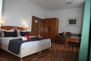 Uma cama ou camas num quarto em Hotel Alt-Erfurt