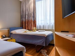 Ліжко або ліжка в номері ibis Heilbronn City