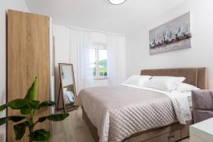 Una cama o camas en una habitación de Villa Nono