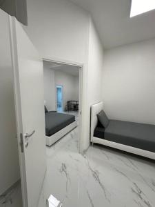 Posteľ alebo postele v izbe v ubytovaní Cernusco luxury Milanese apartment