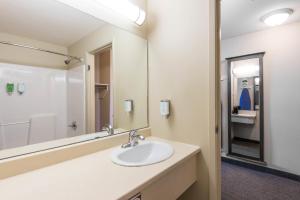 A bathroom at Super 8 by Wyndham Windsor NS