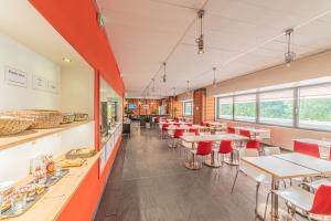 Restoran ili drugo mesto za obedovanje u objektu Residence Montempo Lyon Cite Internationale