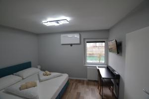 Llit o llits en una habitació de Stadthotel Das Villach