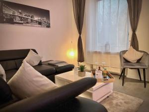 Area tempat duduk di G&G Luxury Apartment am Stadtpark Bendorf