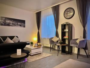 Area tempat duduk di G&G Luxury Apartment am Stadtpark Bendorf